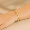 Tubogas bracelet in solid 14K yellow gold, view 3