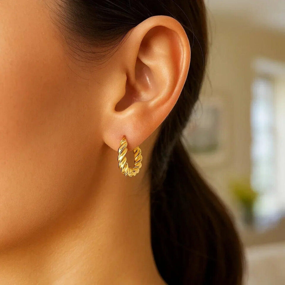 Twisted polished hoop earrings in solid 14K yellow gold, view 3
